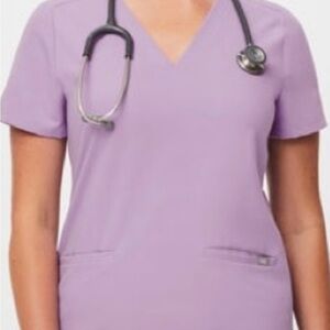 Figs Technical scrub top size large. Brand new never worn.NWOT